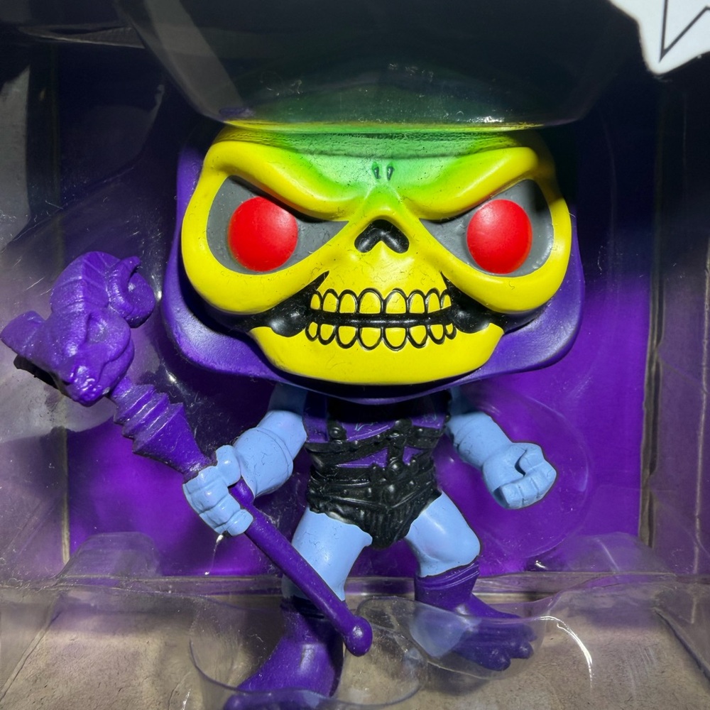 Funko Action Figure - Purple, Yellow, Red, and Green